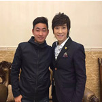 邰正宵與經(jīng)紀人李志合影